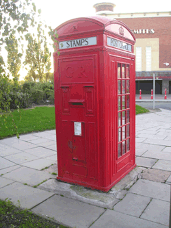 K4 kiosk with stamp vending and post box.